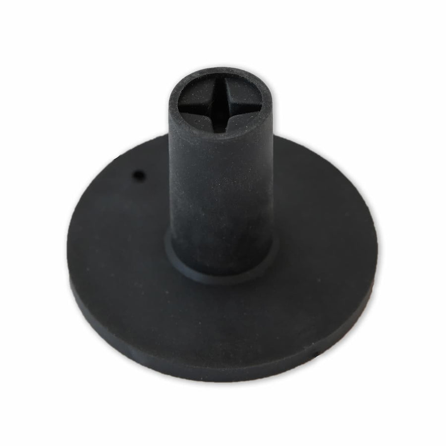 Rubber tee holder with tee inserted