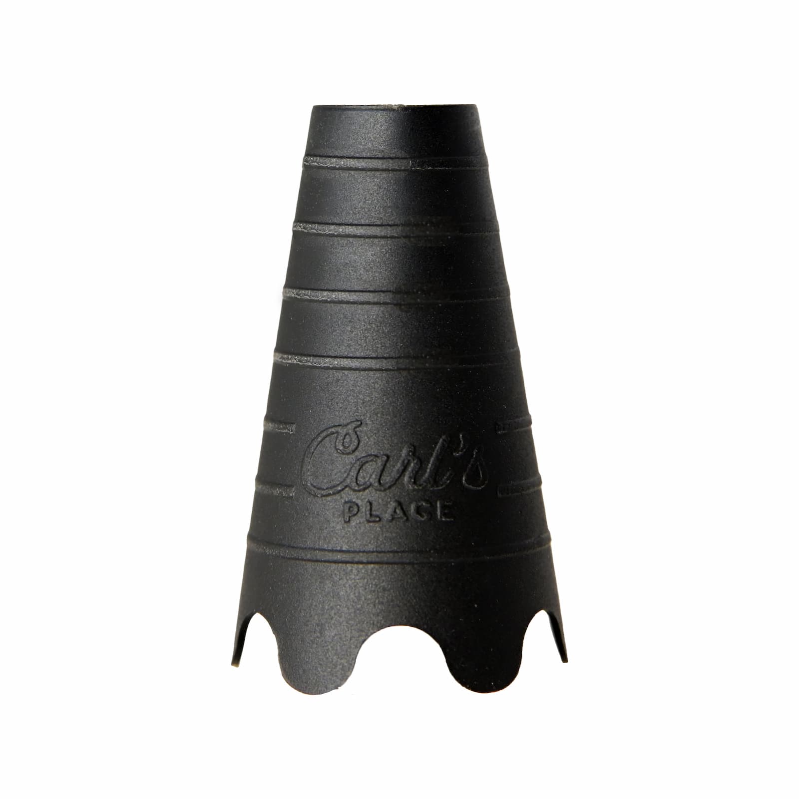 Golf ball resting on rubber simulator tee