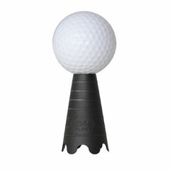 Golf ball resting on rubber simulator tee