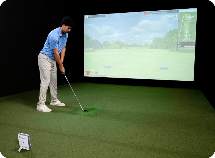 FlightScope Mevo Gen2 launch monitor in an indoor golf simulator