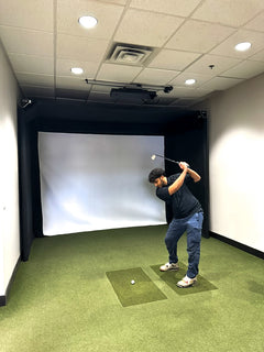SportScreen Parlour freestanding golf simulator studio enclosure — in use