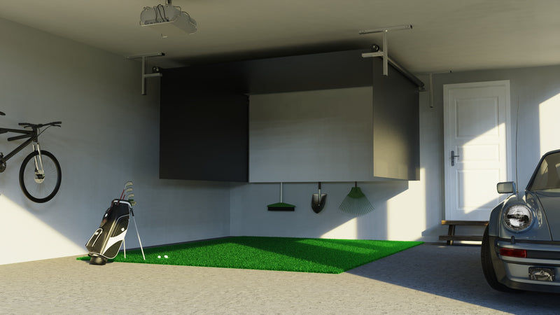 SportScreen Vanish Series retractable golf simulator enclosure — half retracted