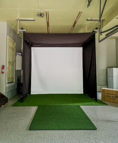 SportScreen Vanish Series retractable golf simulator enclosure — installed garage
